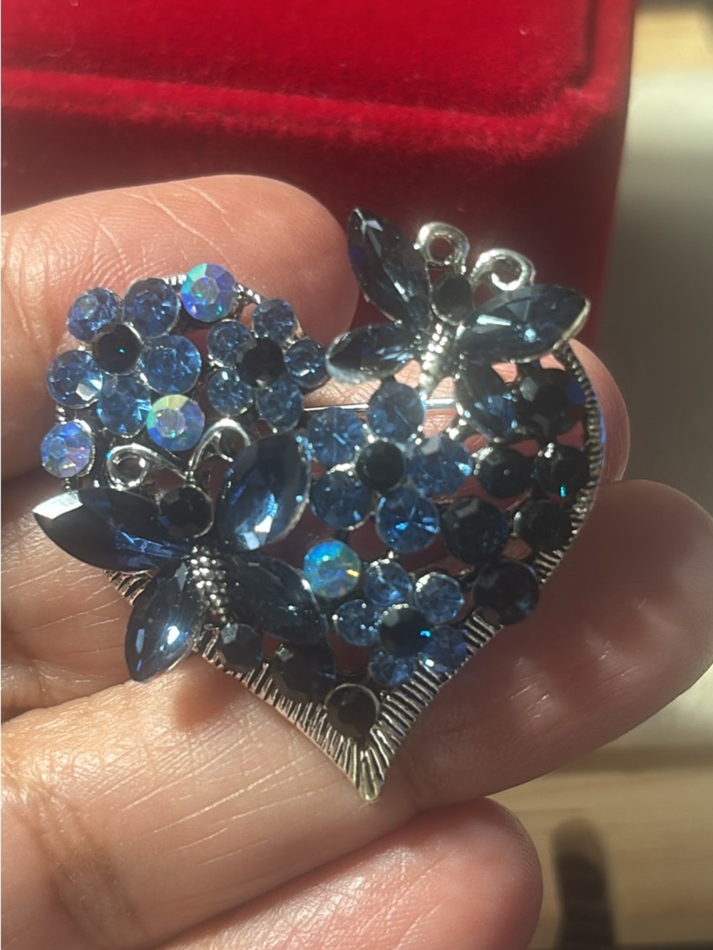 Heart-Shaped Blue Crystal Brooch with Floral and Butterfly Motifs